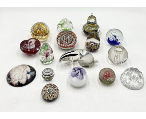 A collection of glass paperweights including Caithness, Selkirk etc.