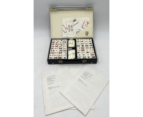 A leather cased 20th century Mahjong set 