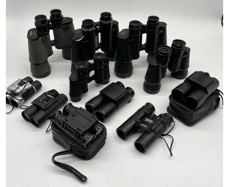A collection of various binoculars including Mamiya, Zenith etc.