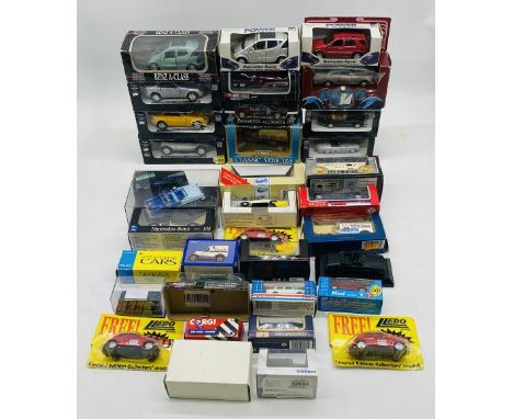 A collection of boxed die-cast cars and other vehicles including Majorette, Corgi, Lledo, ERTL, New-Ray Toys, Masisto, Oxford