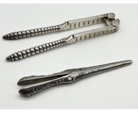 An oversized silver plated lobster/nutcracker (height 25cm) along with a pair of hallmarked silver glove stretchers