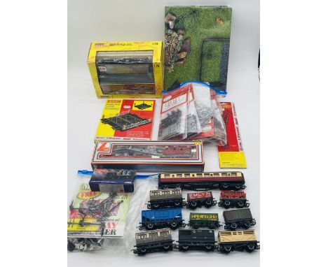 A collection of various model railway OO gauge accessories including unboxed rolling stock, boxed Scenix shed, Hornby double 
