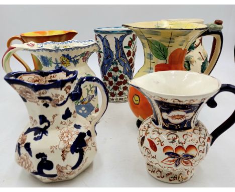 A collection of assorted jugs to include Masons Regency, Masons Ironstone etc