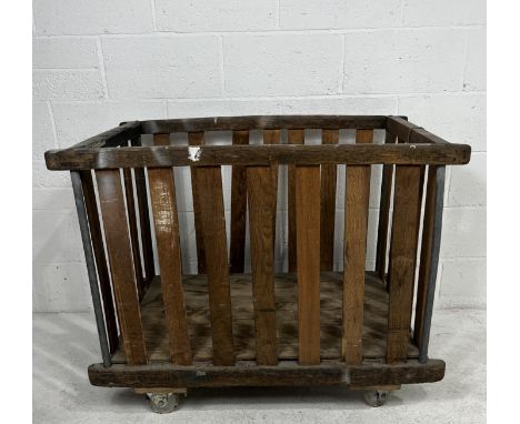 A vintage wooden factor slatted bobbin trolley originally from Axminster Carpets- length 107cm