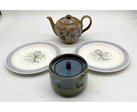 A pair of Susie Cooper plates along with a Doulton Lambeth tea pot and a Royal Doulton tobacco jar