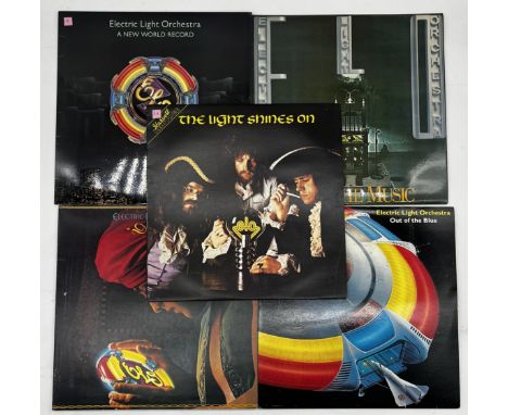 Five ELO Electric Light Orchestra 12" vinyl vintage albums. The Light Shines On, Out of the Blue, Discovery, Face the Music a