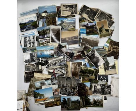 An assortment of vintage postcards to include Exeter, Edinburgh, Plymouth, Scotland, Cornwall etc Lot also contains a cream c