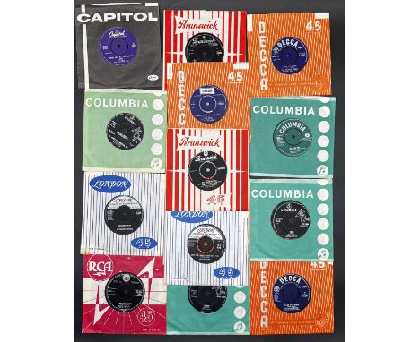 A collection of mostly1960s 7" vinyl in their original record label sleeves including Bill Haley - Rock Around The Clock on B