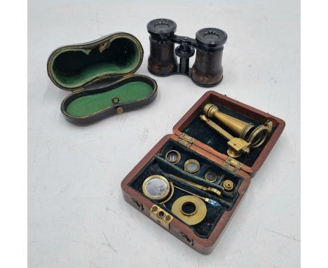 A brass pocket Cary London microscope in a mahogany case (incomplete) along with a pair of opera glasses in a leather case 