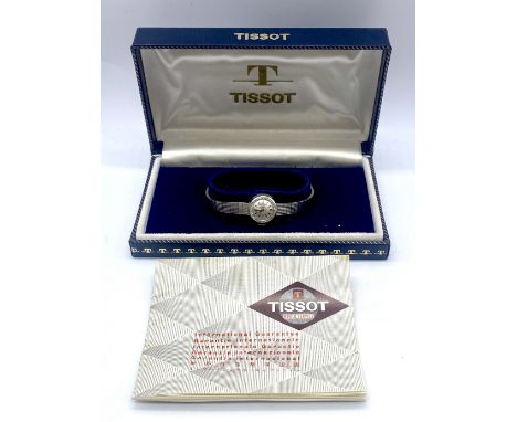 Tissot ladies 9ct white gold quartz bracelet dress watch, with satin face, having Baton numerals. Original Tissot box and int