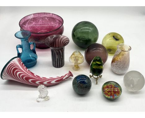 A collection of assorted glassware including glass floats, Nailsea style horn, paperweights, large bowl, Mdina vase etc.