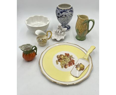 A collection of assorted china including Crown Devon cake plate, jelly mould etc.