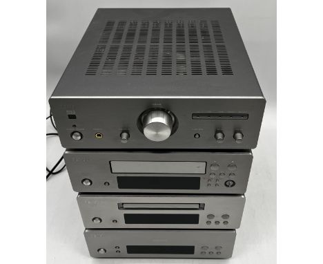 A Denon stacking Hi-Fi system comprising CD Player, Amplifier, Cassette Tape Deck, Tuner, leads. Untested 