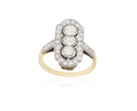 A DIAMOND DRESS RING, composed of a trio European-cut diamonds within collet-setting, to a surround and shoulders of similarl