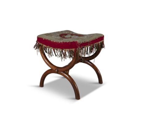 A 19TH CENTURY STAINED BEECH 'X' FRAMED UPHOLSTERED DRESSING STOOL, with curved padded seat, covered in tapestry cloth. 42.5 