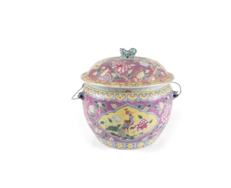 A LARGE FAMILLE ROSE JAR AND COVER, 19th century, enamelled with cartouche shaped panel, filled with phoenix birds and fruits