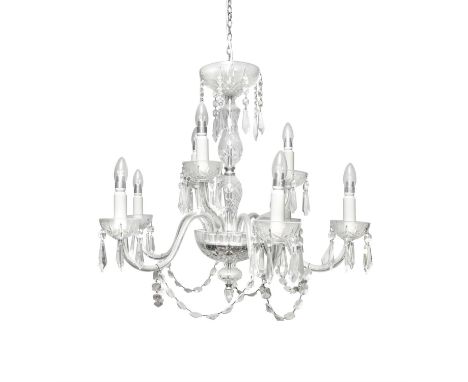 A WATERFORD 'LISMORE' NINE BRANCH CUT GLASS CHANDELIER, with scroll arm branches, hung with pendant droplets and facet bead c