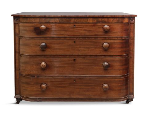 A WILLIAM IV MAHOGANY SCOTCH CHEST, of bowfront design, the shaped panel top above four long graduated drawers, turned button