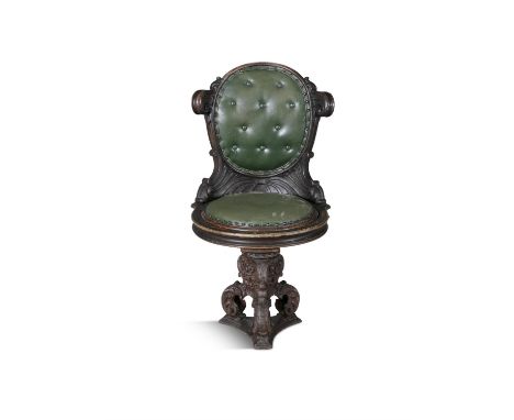 A 19TH CENTURY REVOLVING SHIP CHAIR, with shaped circular back and seat, covered in green button back hide, on splayed cast i