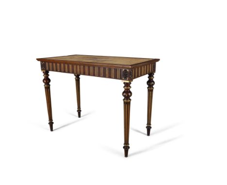A WALNUT AND PARCEL GILT RECTANGUALR WRITING TABLE, 19th century, fitted with leather inset wiring panel above a fitted friez