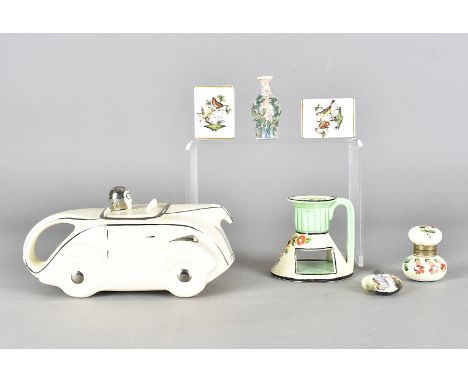 A Sadler racing car OKT42 teapot, in cream and silver, together with a Japanese pottery chamber stick and match box holder, t