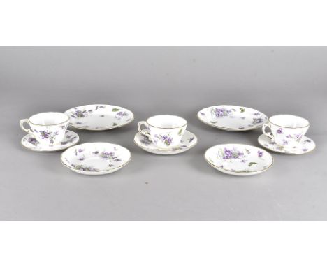 A Hammersley Victorian Violets tea set, comprising eleven cups, twelve saucers, two biscuit plates and twelve side plates 