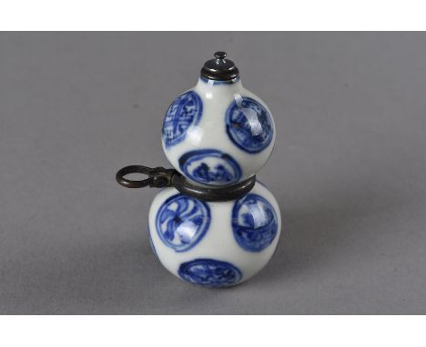 A Meiji period Japanese double gourd porcelain netsuke and snuff bottle, A Meiji period Japanese double gourd porcelain netsu