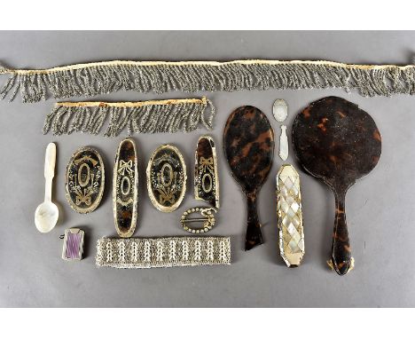 A group of Victorian tortoiseshell and mother of pearl and other items, including a mop teaspoon, three inlaid dressing table