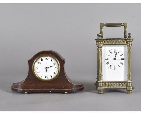 A 19th Century brass carriage timepiece, four glass with column decorated corners, 16.5 cm to extended handle together with a