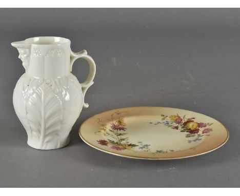 Two items of porcelain by Royal Worcester, including a Blanc de Chine jug and a small blush ivory cabinet plate no.5771 (2) 