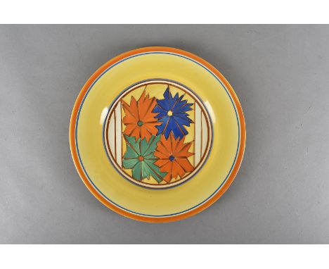 A Clarice Cliff Fantasque Wilkinson plate, Umbrella pattern with yellow, blue and orange rim, printed factory mark to undersi