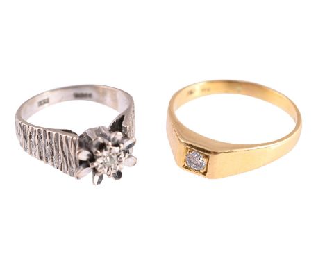 
	
		TWO 1970S DIAMOND SET RINGS  
		The first with a brilliant cut diamond within a leaf shaped surround, to textured tapere