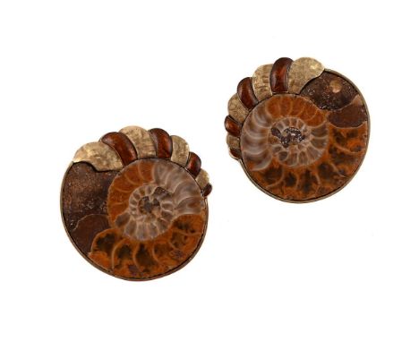 
	
		A PAIR OF AMMONITE AND ENAMEL EARRINGS 
		Each polished ammonite within textured and brown enamel surrounds, stud fittin