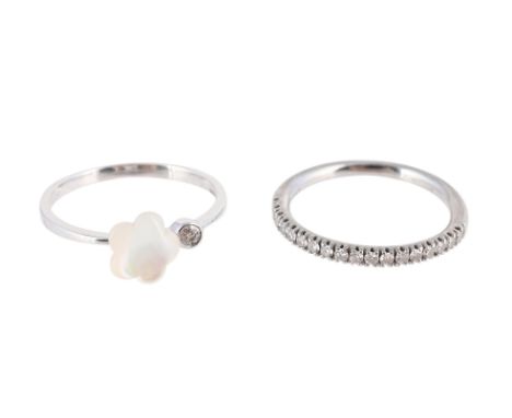 
	
		Y&nbsp;TWO DIAMOND RINGS, ONE WITH A MOTHER OF PEARL FLOWER 
		A diamond and mother of pearl ring, the shank stamped FL 