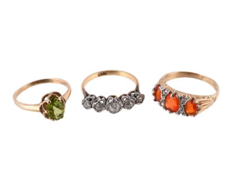
	
		THREE GEM SET RINGS 
		The first a five stone diamond ring, the old European cut diamonds in illusion settings, to a pol