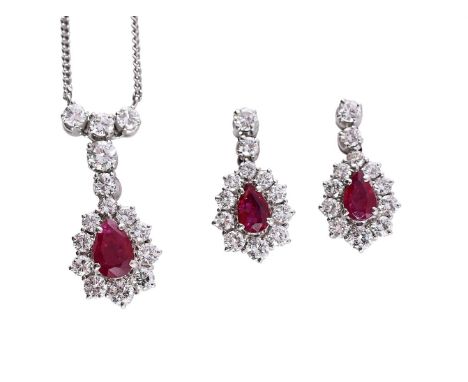 
	
		A RUBY AND DIAMOND CLUSTER PENDANT AND EARRINGS 
		The pendant with a pear shaped ruby within a surround of graduated br