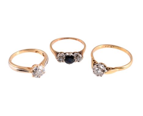 
	
		THREE GEM SET RINGS 
		The first with a cluster of brilliant cut diamonds, approximately 0.20 carats total, to an 18 car