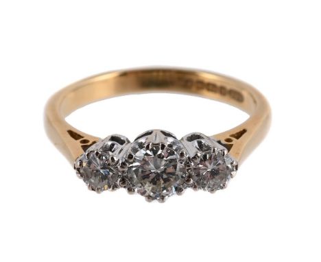 
	
		A DIAMOND THREE STONE RING 
		BIRMINGHAM 1968 
		The graduated brilliant cut diamonds in claw settings to an 18 carat go