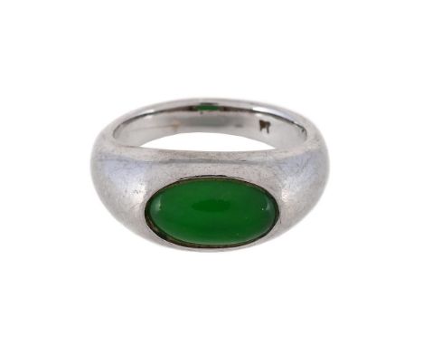 
	
		A JADEITE JADE RING 
		The oval cabochon jadeite jade set in a tapered band, stamped PT 
		Size/dimensions: ring size K 