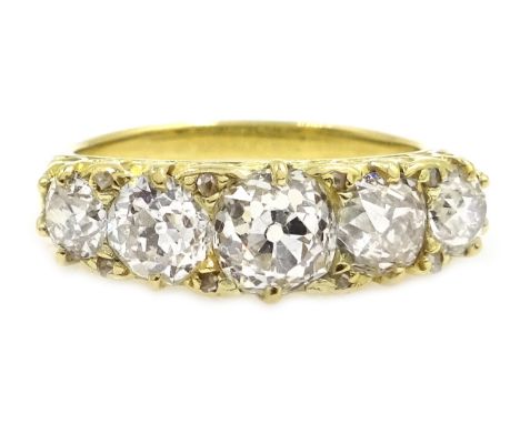 18ct gold (tested) five stone diamond ring, central diamond approx 0.9 carat Condition Report Approx 5.3gm, size N