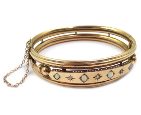 Victorian 9ct gold opal and diamond hinged bangle, Chester 1899 Condition Report Approx 12.5gm