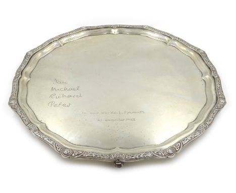 Silver salver by Adie Bros Sheffield 1963, Celtic border on three hoof feet diameter 31cm 29.5oz Condition Report Click here 