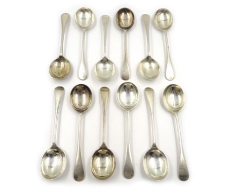 Set of twelve silver soup spoons by C W Fletcher & Son Ltd, Sheffied 1921, 28oz Condition Report Click here for further image