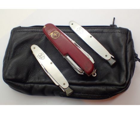 Two pipe smokers penknives and a multi blade Swiss style knife and a leather tobacco patch 