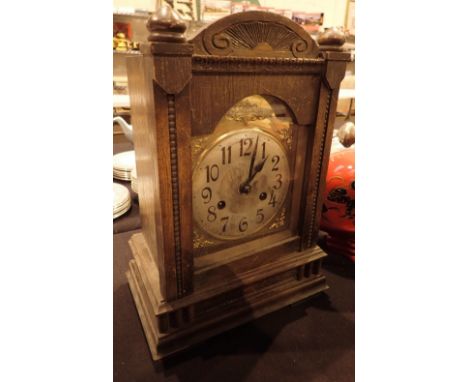 Wood cased chiming mantel clock with gilt chapter