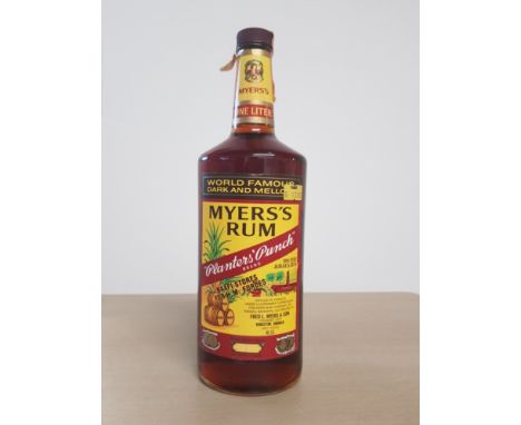 A BOTTLE OF MYERS RUM PLANTERS PUNCH 100% FINE JAMAICAN R