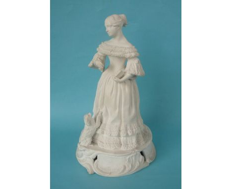 Queen Victoria: a good white bisque porcelain figure probably by Minton depicted in a long dress with her dog Dash at her fee