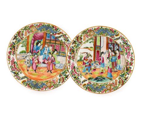 A Pair of Royal Worcester Porcelain Plates, painted by Po-Hing, circa 1875, in famille rose type enamels with courtly figures