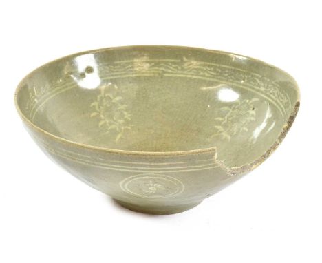  A Korean Slip-Inlaid Celadon Bowl, probably Goryeo Dynasty (918-1392), the exterior with four foliate roundels within line b