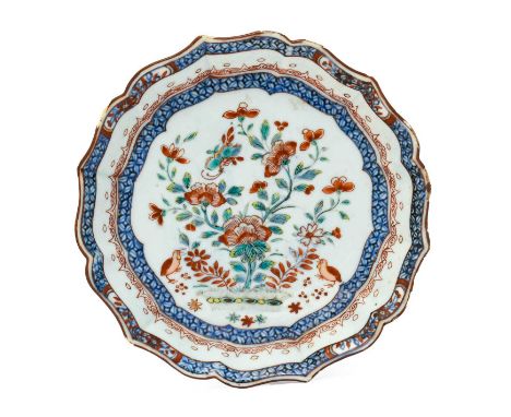 A Dutch-Decorated Chinese Porcelain Dish, Qianlong, of silver shape, painted in enamels and gilding with two quail beneath a 